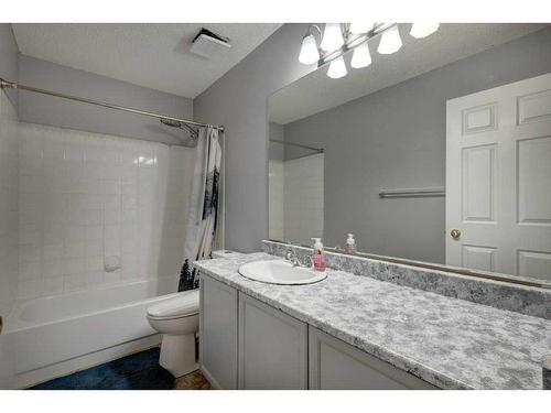 9-7 Westland Road, Okotoks, AB - Indoor Photo Showing Bathroom