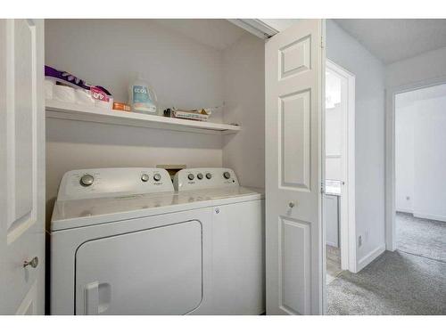 9-7 Westland Road, Okotoks, AB - Indoor Photo Showing Laundry Room