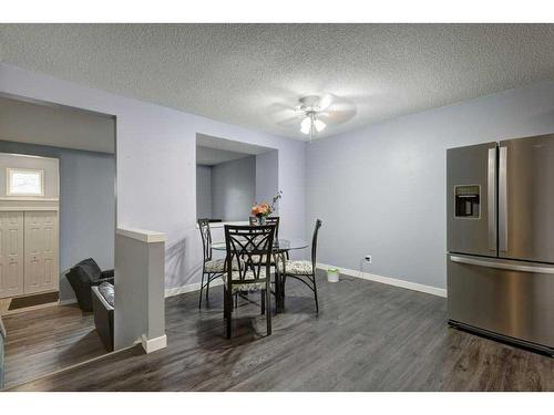 9-7 Westland Road, Okotoks, AB - Indoor Photo Showing Dining Room