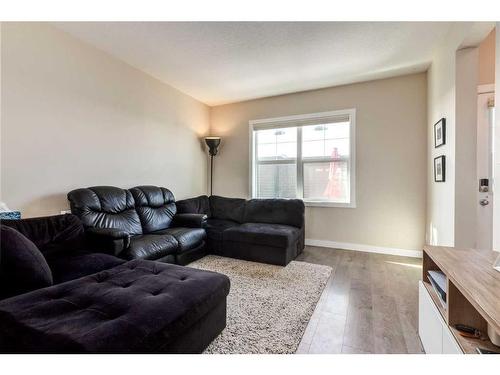 260 Midyard Lane Sw, Airdrie, AB - Indoor Photo Showing Living Room