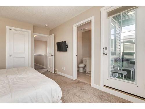 260 Midyard Lane Sw, Airdrie, AB - Indoor Photo Showing Bedroom