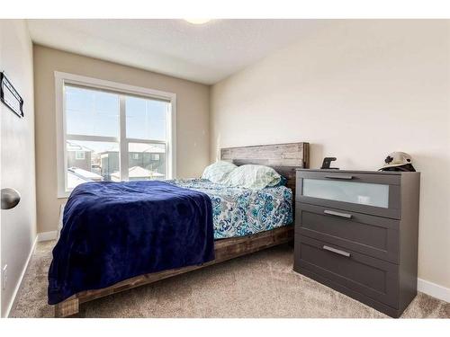 260 Midyard Lane Sw, Airdrie, AB - Indoor Photo Showing Bedroom