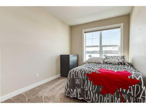 260 Midyard Lane Sw, Airdrie, AB - Indoor Photo Showing Bedroom