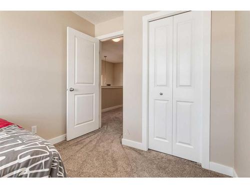 260 Midyard Lane Sw, Airdrie, AB - Indoor Photo Showing Bedroom