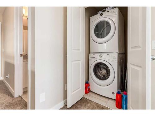 260 Midyard Lane Sw, Airdrie, AB - Indoor Photo Showing Laundry Room