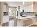 260 Midyard Lane Sw, Airdrie, AB  - Indoor Photo Showing Kitchen With Upgraded Kitchen 