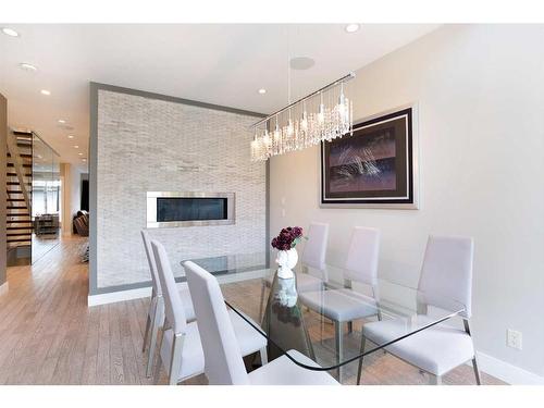 2614 21 Street Sw, Calgary, AB - Indoor Photo Showing Dining Room With Fireplace