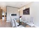 2614 21 Street Sw, Calgary, AB  - Indoor Photo Showing Dining Room With Fireplace 