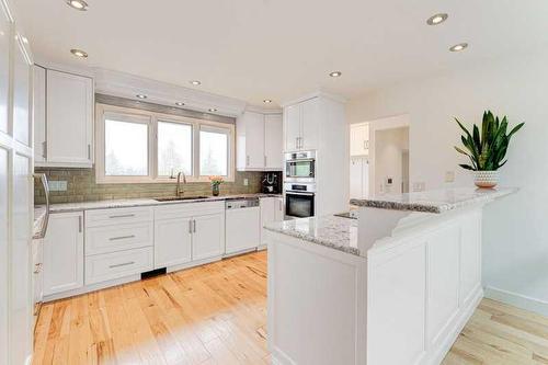 72 Canova Road Sw, Calgary, AB - Indoor Photo Showing Kitchen With Upgraded Kitchen