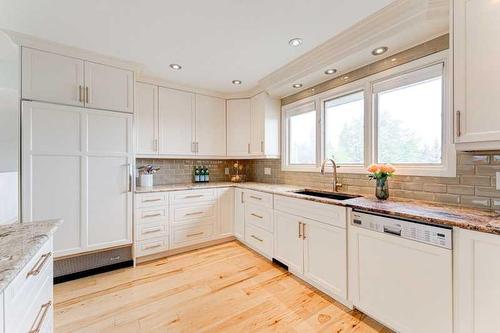 72 Canova Road Sw, Calgary, AB - Indoor Photo Showing Kitchen