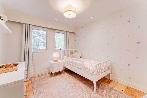 72 Canova Road Sw, Calgary, AB - Indoor Photo Showing Bedroom