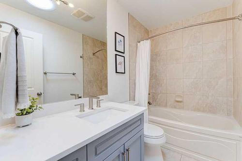 72 Canova Road Sw, Calgary, AB - Indoor Photo Showing Bathroom