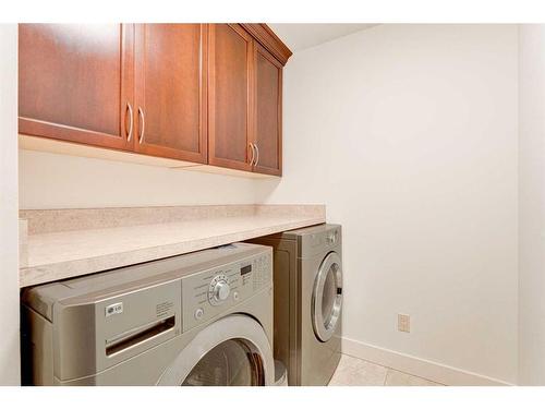 72 Canova Road Sw, Calgary, AB - Indoor Photo Showing Laundry Room