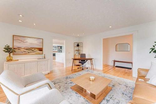 72 Canova Road Sw, Calgary, AB - Indoor Photo Showing Living Room