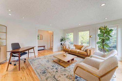 72 Canova Road Sw, Calgary, AB - Indoor Photo Showing Living Room