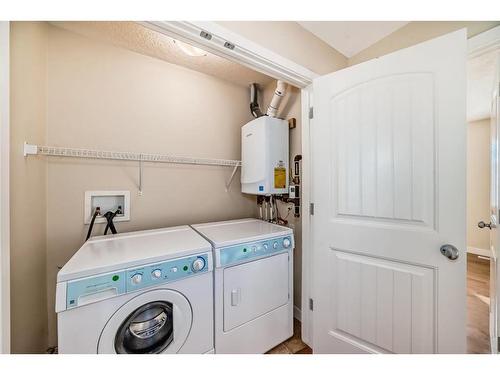 54 Sage Hill Common Nw, Calgary, AB - Indoor Photo Showing Laundry Room