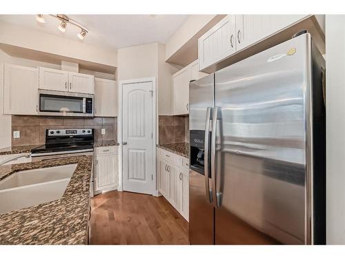 54 Sage Hill Common Nw, Calgary, AB - Indoor Photo Showing Kitchen With Double Sink With Upgraded Kitchen