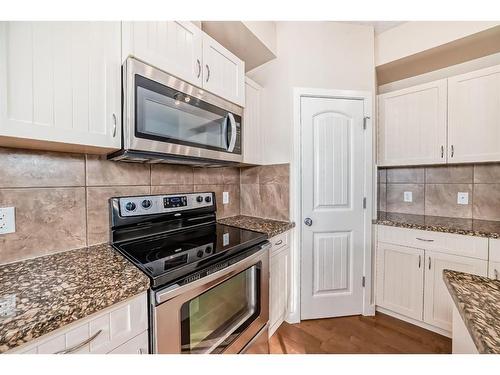 54 Sage Hill Common Nw, Calgary, AB - Indoor Photo Showing Kitchen With Upgraded Kitchen