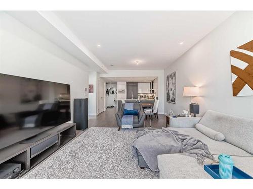 206-930 16 Avenue Sw, Calgary, AB - Indoor Photo Showing Living Room