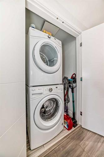 206-930 16 Avenue Sw, Calgary, AB - Indoor Photo Showing Laundry Room