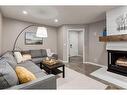 112 Thorson Crescent, Okotoks, AB  - Indoor Photo Showing Living Room With Fireplace 