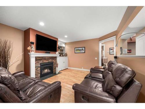 43 Woodford Court Sw, Calgary, AB - Indoor Photo Showing Living Room With Fireplace