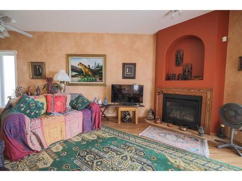 72 Hamptons Link Nw, Calgary, AB - Indoor Photo Showing Living Room With Fireplace