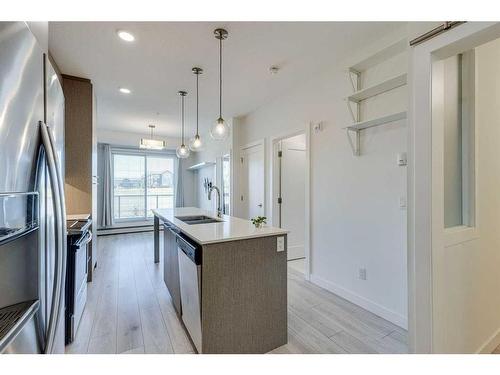 1131-76 Cornerstone Passage Ne, Calgary, AB - Indoor Photo Showing Kitchen With Upgraded Kitchen