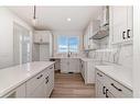 371 Sora Boulevard Se, Calgary, AB  - Indoor Photo Showing Kitchen 