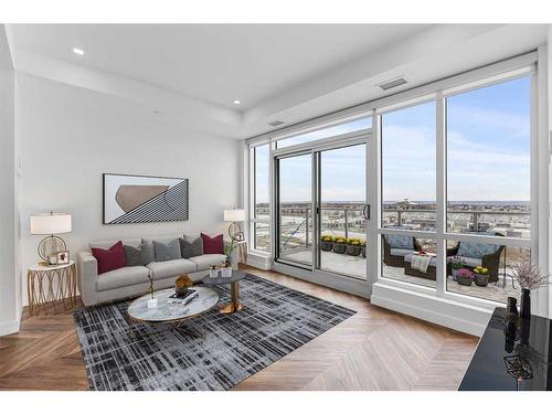 707-8445 Broadcast Avenue Sw, Calgary, AB - Indoor Photo Showing Living Room