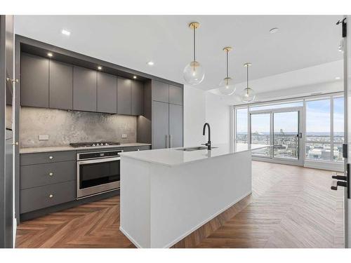 707-8445 Broadcast Avenue Sw, Calgary, AB - Indoor Photo Showing Kitchen With Upgraded Kitchen