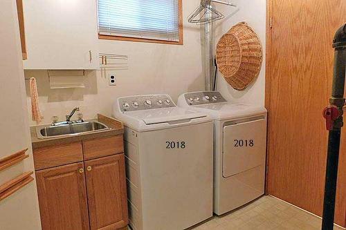 335 48 Avenue West, Claresholm, AB - Indoor Photo Showing Laundry Room