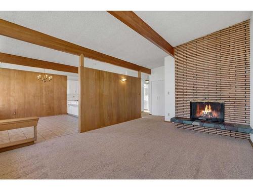 3903 Charleswood Drive Nw, Calgary, AB - Indoor With Fireplace