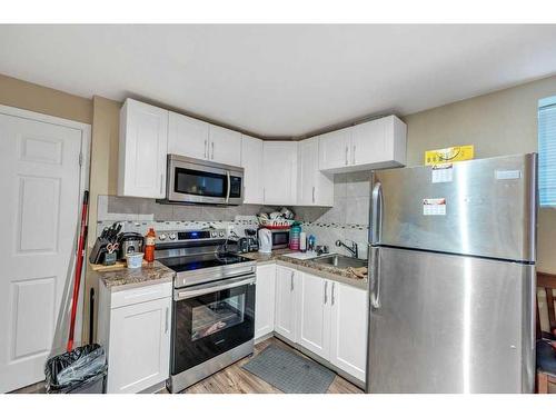 283 Coville Close Ne, Calgary, AB - Indoor Photo Showing Laundry Room