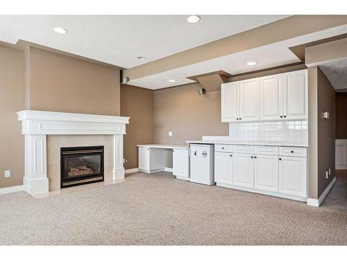 739 Hawkside Mews Nw, Calgary, AB - Indoor Photo Showing Other Room With Fireplace