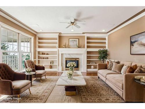 739 Hawkside Mews Nw, Calgary, AB - Indoor Photo Showing Living Room With Fireplace