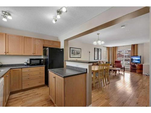 147 Prestwick Court Se, Calgary, AB - Indoor Photo Showing Kitchen With Double Sink