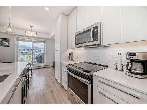 2317-76 Cornerstone Passage Ne, Calgary, AB - Indoor Photo Showing Kitchen With Upgraded Kitchen