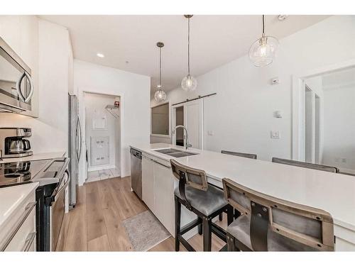 2317-76 Cornerstone Passage Ne, Calgary, AB - Indoor Photo Showing Kitchen With Double Sink With Upgraded Kitchen