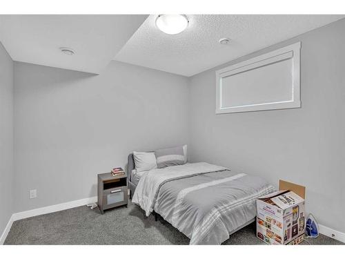 77 Herron Mews Ne, Calgary, AB - Indoor Photo Showing Bedroom