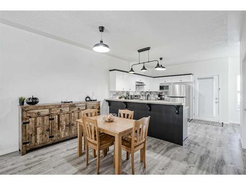 703-2001 Luxstone Boulevard Sw, Airdrie, AB - Indoor Photo Showing Dining Room