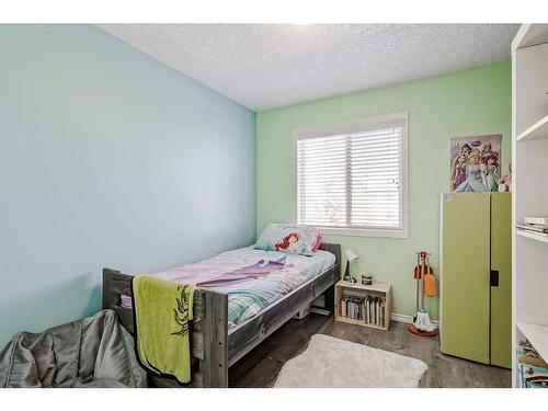 703-2001 Luxstone Boulevard Sw, Airdrie, AB - Indoor Photo Showing Bedroom