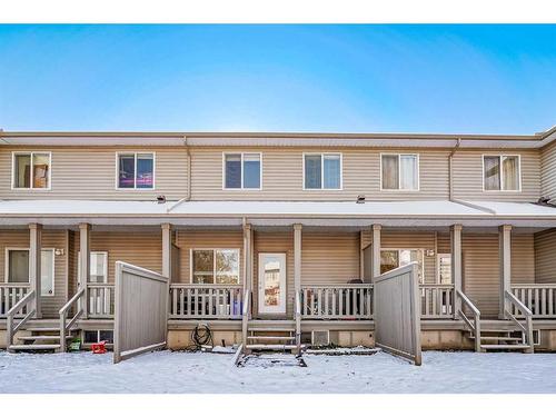 703-2001 Luxstone Boulevard Sw, Airdrie, AB - Outdoor With Deck Patio Veranda