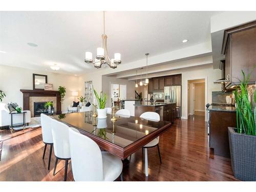 76 Mahogany Manor Se, Calgary, AB - Indoor Photo Showing Dining Room With Fireplace