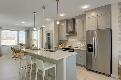 119 Legacy Passage Se, Calgary, AB - Indoor Photo Showing Kitchen With Double Sink With Upgraded Kitchen