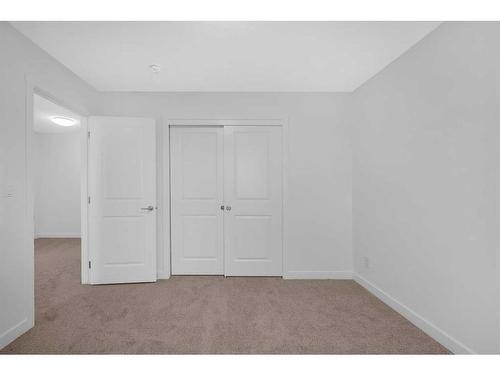 255 Baneberry Way, Airdrie, AB - Indoor Photo Showing Other Room