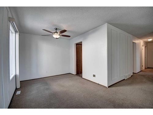 135 Pensville Road Se, Calgary, AB - Indoor Photo Showing Other Room