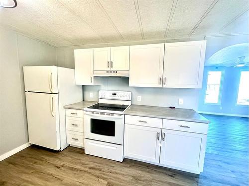 1921 21 Street, Nanton, AB - Indoor Photo Showing Kitchen