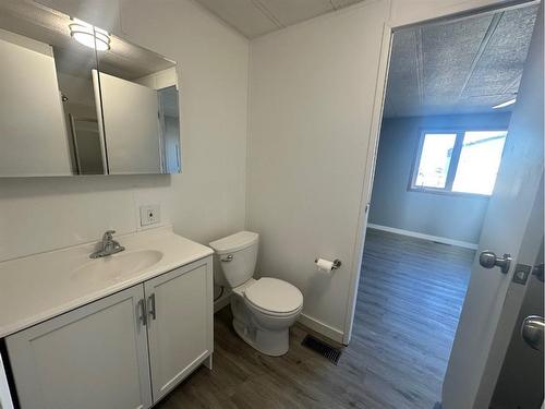 1921 21 Street, Nanton, AB - Indoor Photo Showing Bathroom