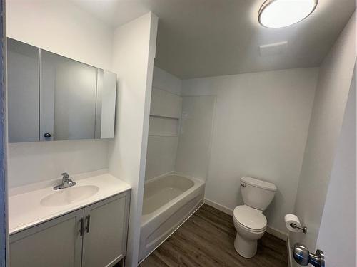 1921 21 Street, Nanton, AB - Indoor Photo Showing Bathroom